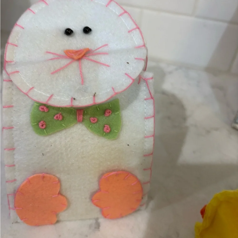 Kids Yellow Bunny Sunglasses and 2 felt bags each with a plastic egg